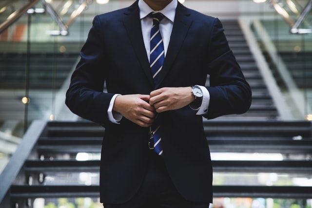 A businessman wearing suit and a tie